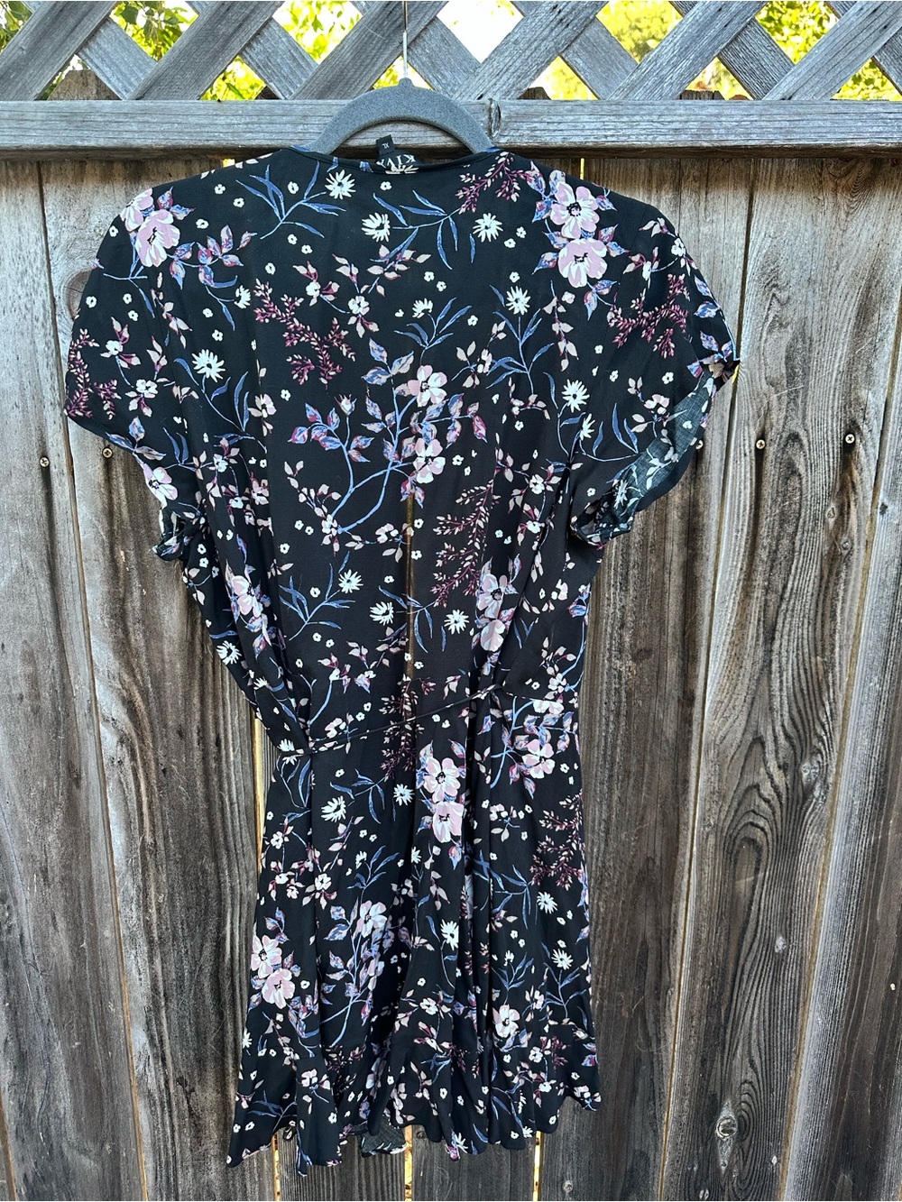 Kivari floral cap sleeve wrap dress